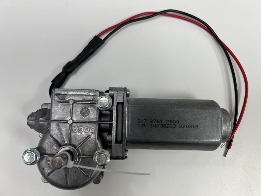 Motor with modified cable and connector assembly from OEM's technical workshop