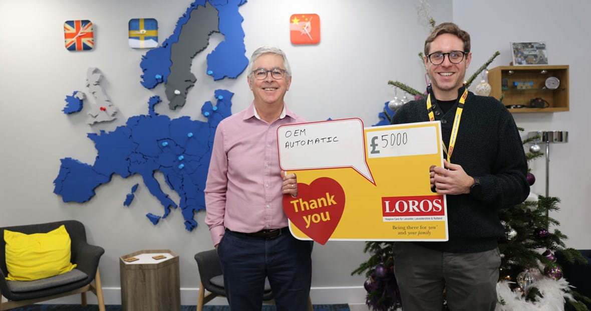 OEM Automatic present Loros with their annual donation