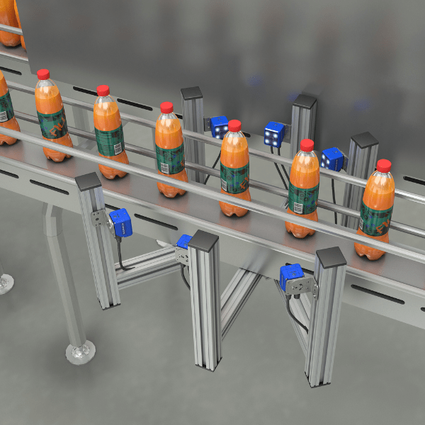 Production line of orange bottles on a conveyor, demonstrating quality control using datalogic imagers