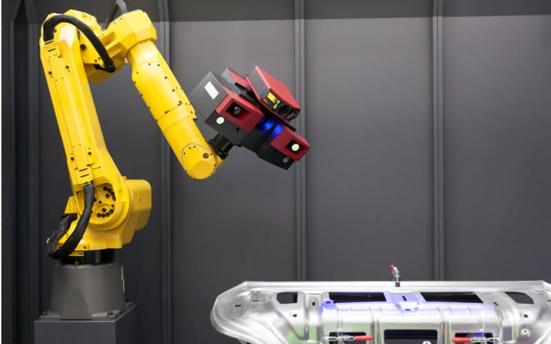 Machine arm using cameras and detection equipment