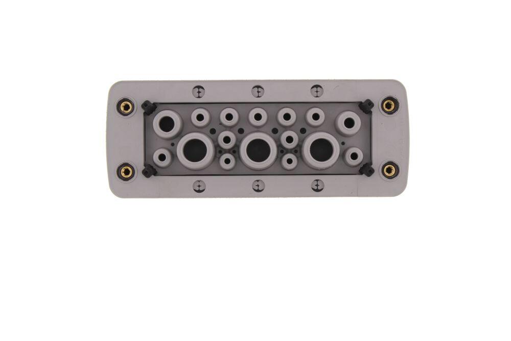 Product image of a grey terminal block with multiple holes for connections, from CONTA-CLIP.