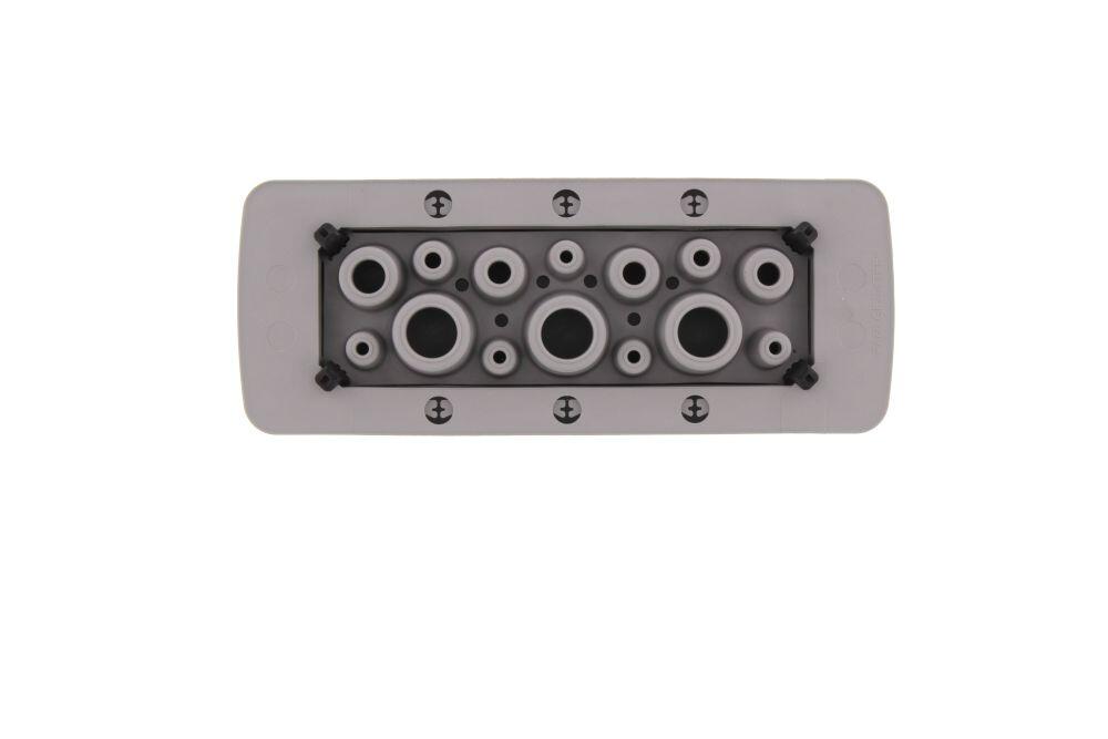Product image of a CONTA-CLIP connection plate with multiple holes for cable entry